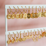 Inspiratiesets Gevulde sieraden displays oorbellen met symbolen