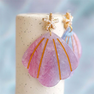 Nieuw Shop it! Resin hangers en roestvrij stalen bedels
