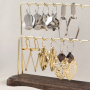 Oorbellen inspiratie met gouden en zilveren bedels en tussenstukken